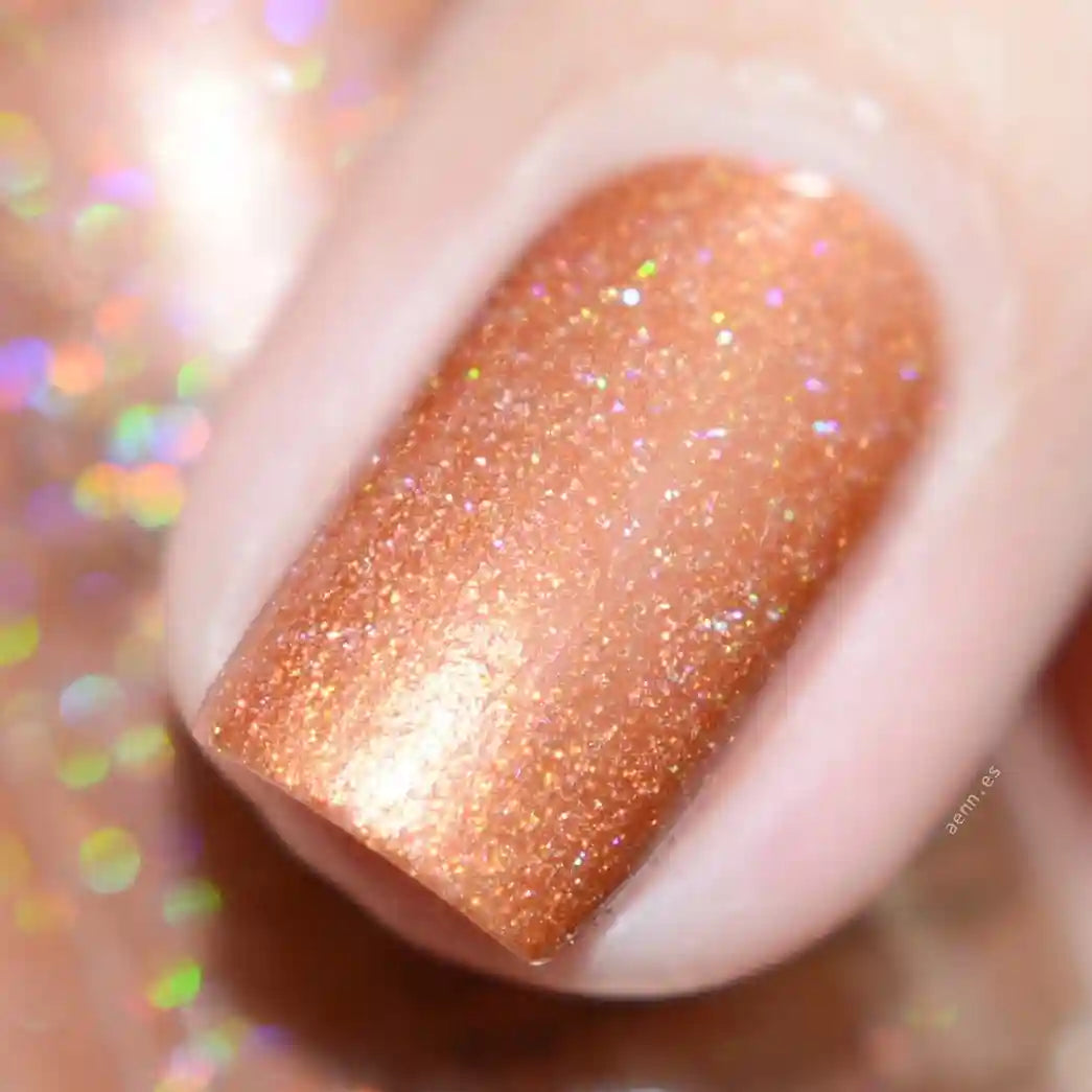 Amber vegan quick-dry nail polish in warm golden-orange with a high-shine finish, 10-free and cruelty-free.