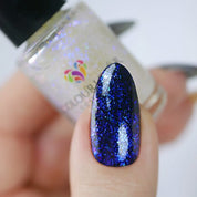 Icy Charm – Vegan 10-free multichromatic blue shimmer nail polish, plant-based, and cruelty-free.
