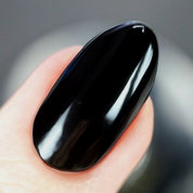 Pitch Black – Vegan 10-free black nail polish with a glossy finish, plant-based, and cruelty-free