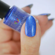 Sapphire – Vegan 10-free deep blue shimmer nail polish with a shimmer finish, plant-based, and cruelty-free