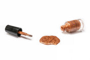 Amber vegan quick-dry nail polish in warm golden-orange with a high-shine finish, 10-free and cruelty-free.