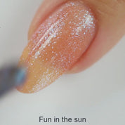Fun in the Sun – Vegan 10-free coral pink nail polish with a cream finish, plant-based, and cruelty-free