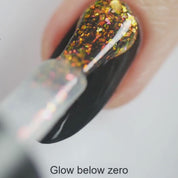 Glow Below Zero – Vegan 10-free gold-to-red color-shifting nail polish with shimmer finish, plant-based, and cruelty-free
