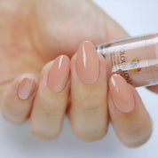 Soft nude and bronze shades with a holographic and metallic finish, perfect for summer manicures.