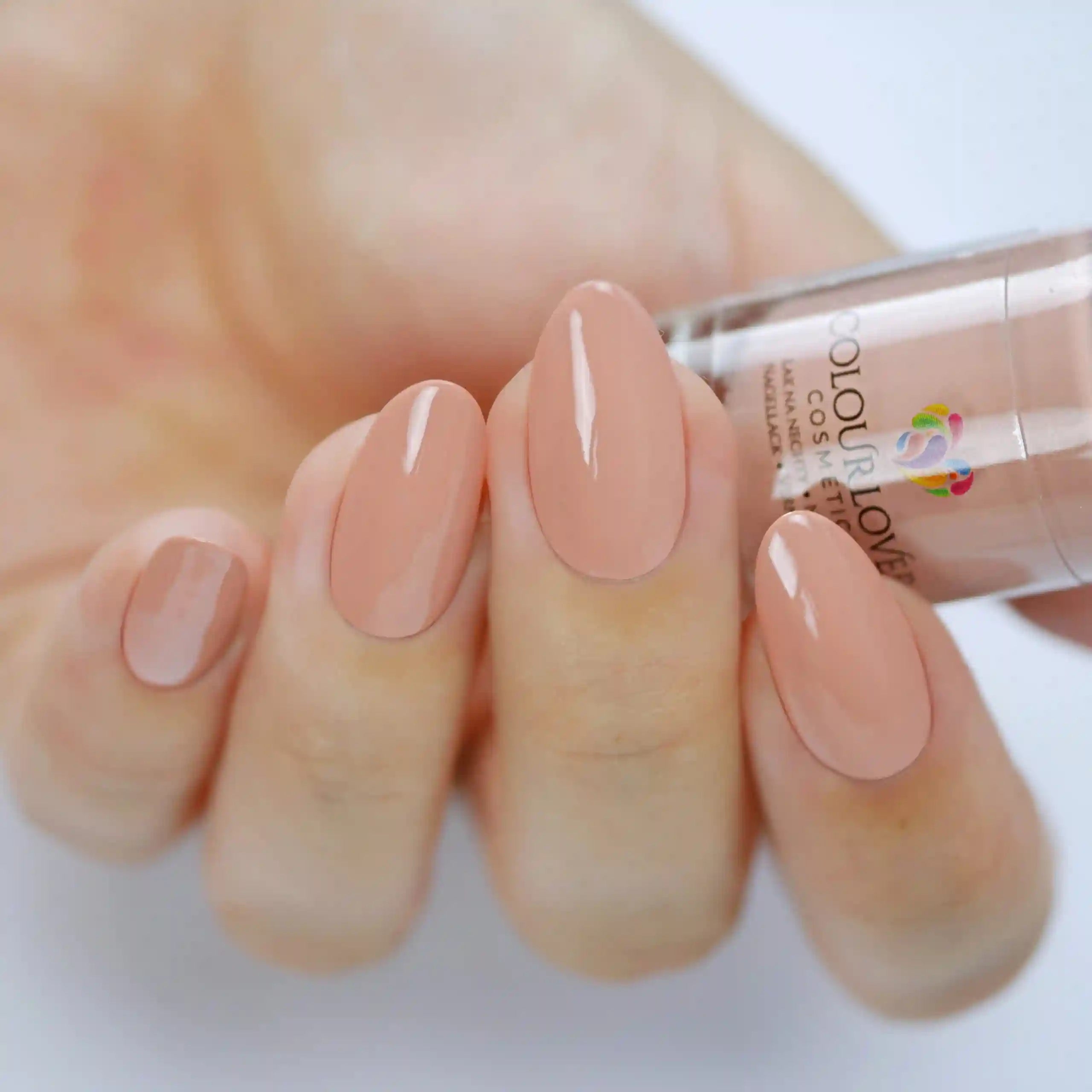 Soft nude and bronze shades with a holographic and metallic finish, perfect for summer manicures.