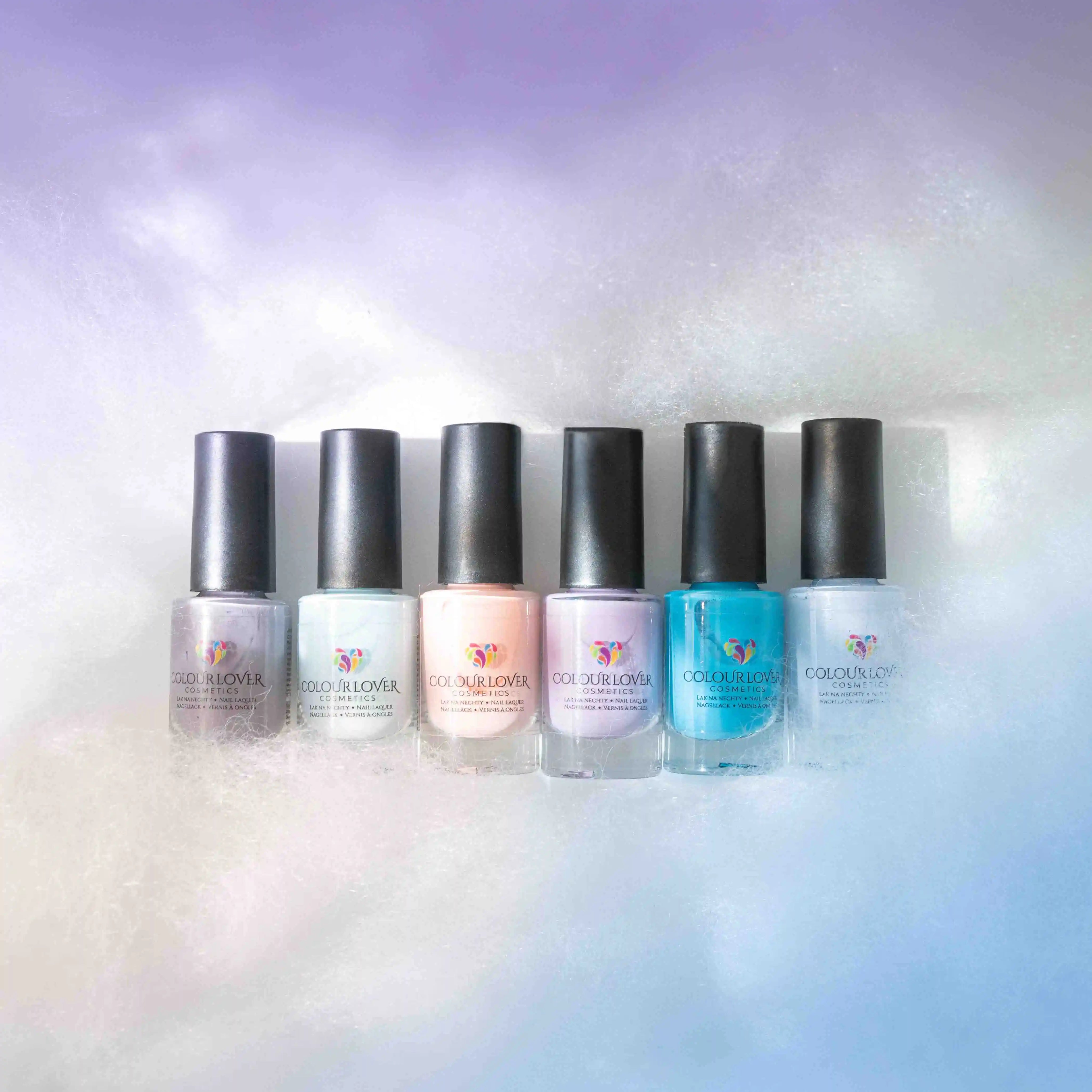 On Cloud 9 Collection – Vegan 10-free pastel nail polish set in blue, purple, gray and nude, plant-based, and cruelty-free