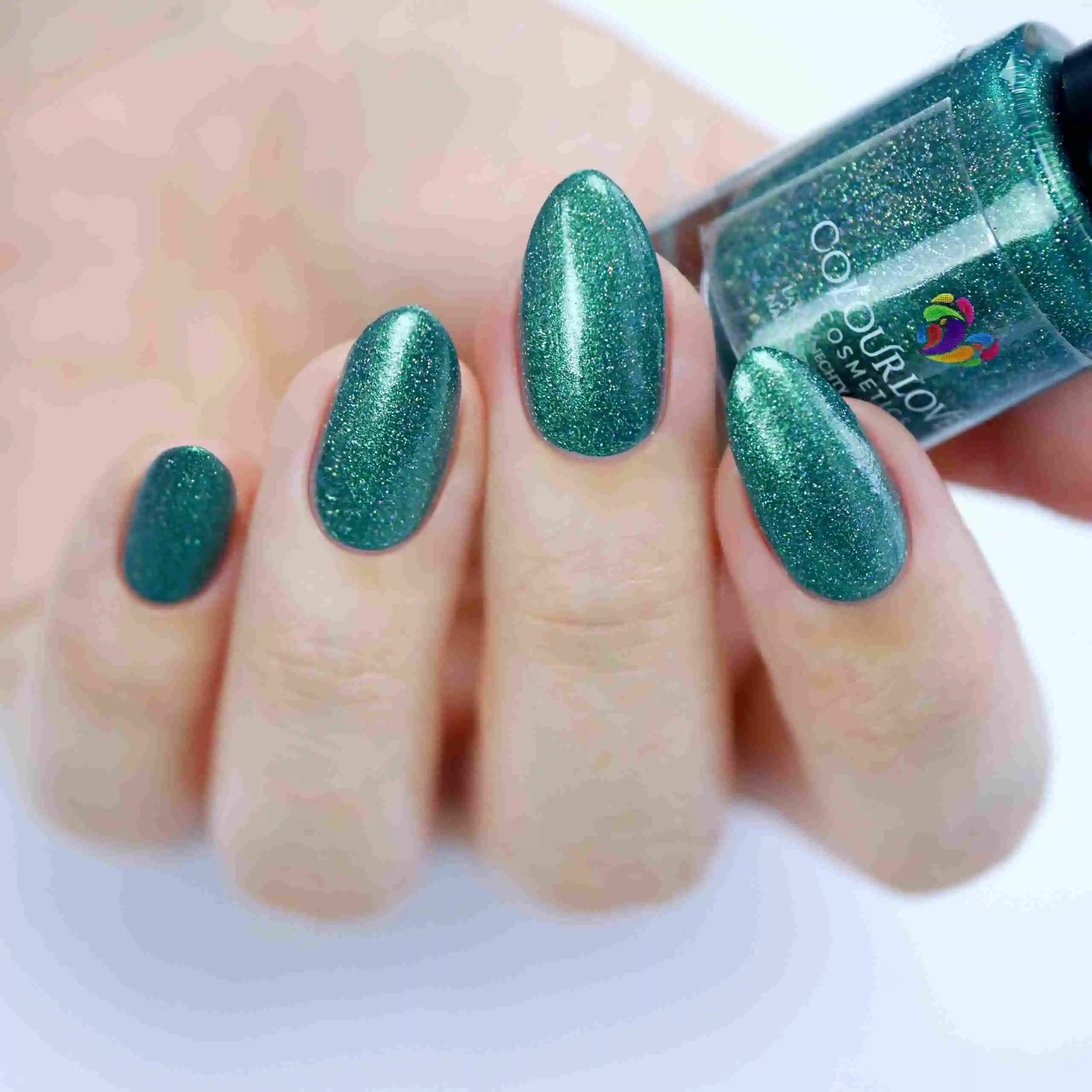 Holo Gems – Vegan 10-free holographic nail polish set with a shimmer finish, plant-based, and cruelty-free.