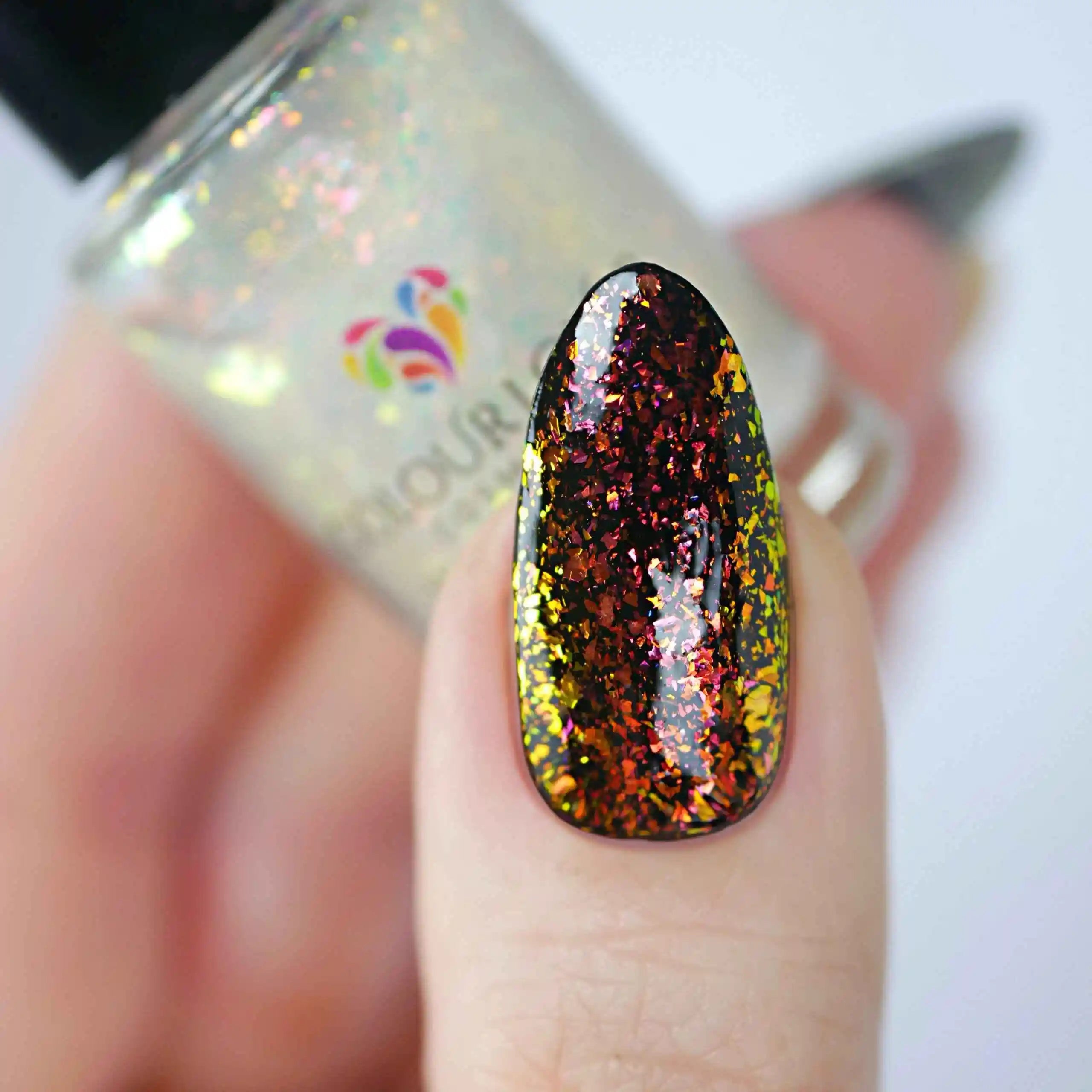 Glow Below Zero – Vegan 10-free gold-to-red color-shifting nail polish with shimmer finish, plant-based, and cruelty-free