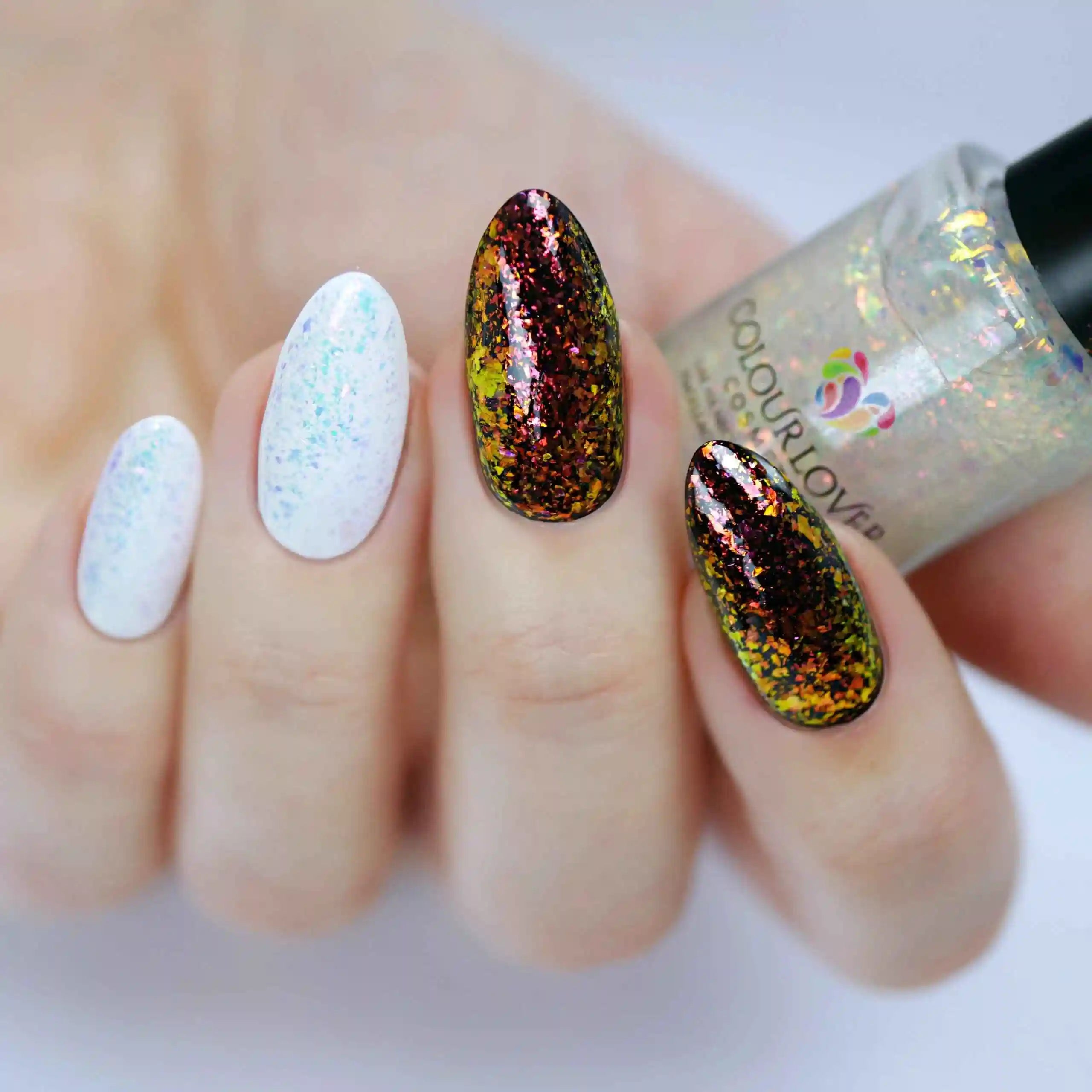 Glow Below Zero – Vegan 10-free gold-to-red color-shifting nail polish with shimmer finish, plant-based, and cruelty-free
