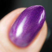 Iris – Vegan 10-free purple shimmer nail polish with a shimmer finish, plant-based, and cruelty-free.