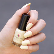 pastel yellow nail polish with plant based, 10-free, vegan, cruelty free, sustainable, safe and healthy formula handmade in Slovakia