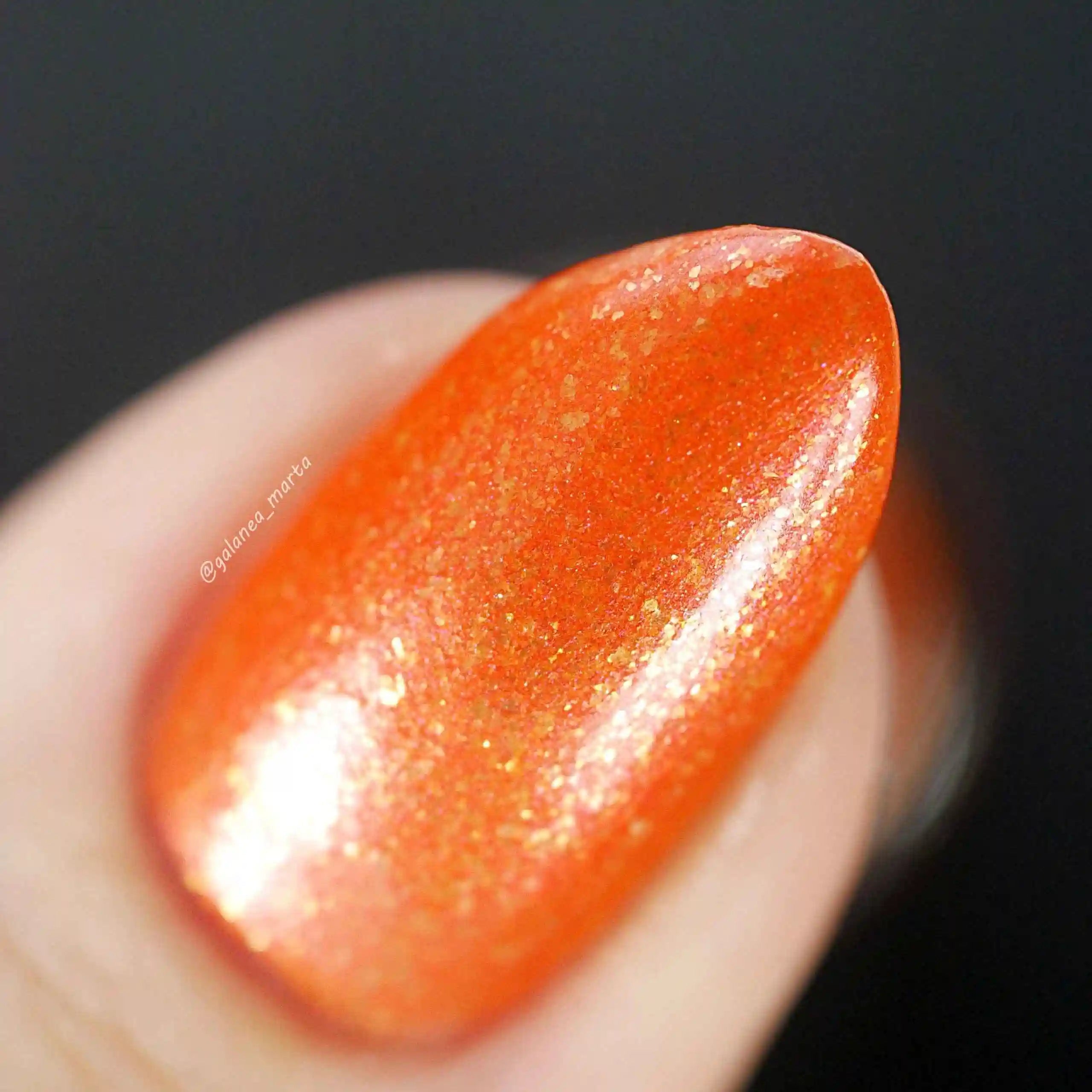 Marigold – Vegan 10-free orange shimmer nail polish with a shimmer finish, plant-based, and cruelty-free.