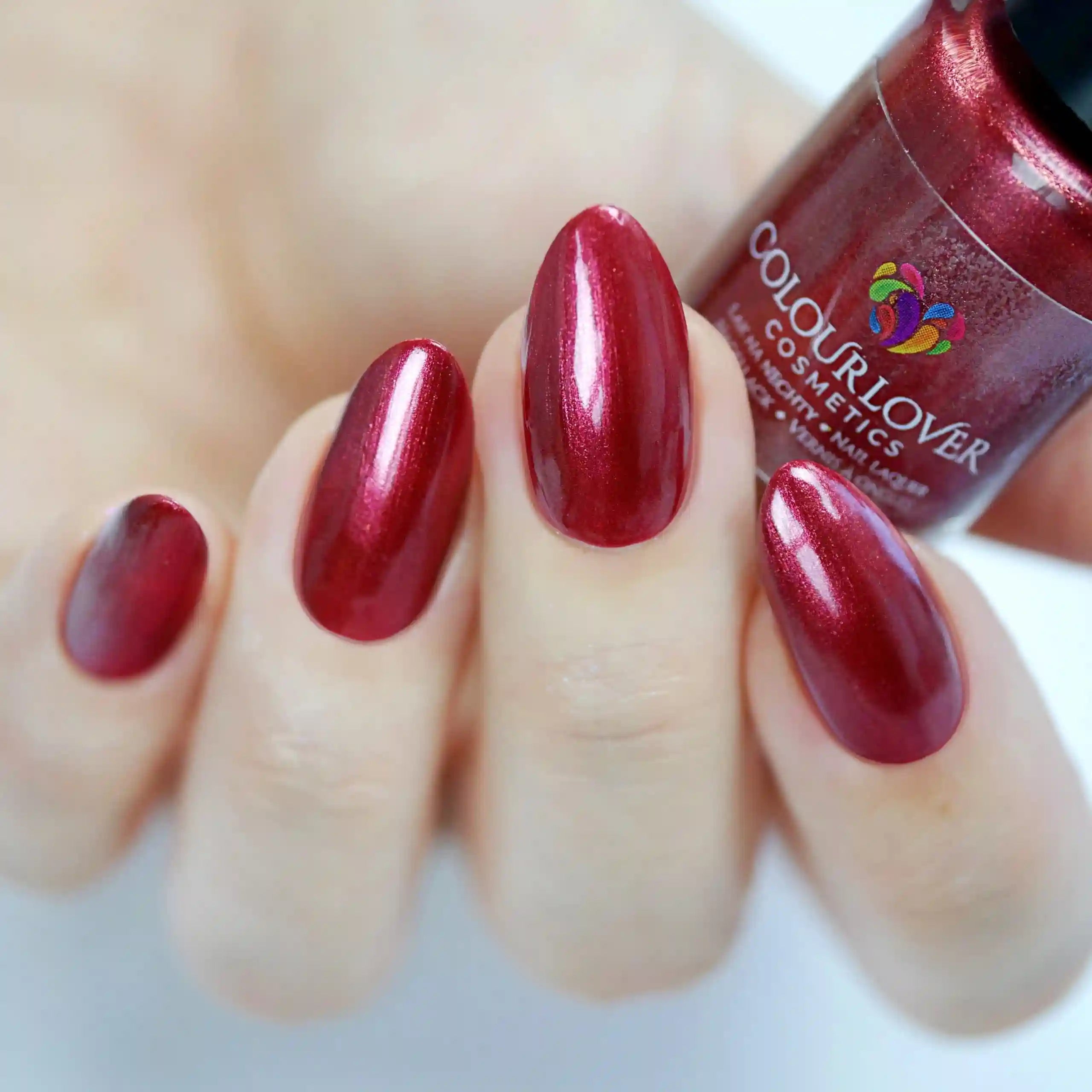 Passionate – Vegan 10-free cranberry red nail polish with a glossy finish, plant-based, and cruelty-free