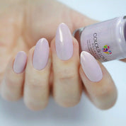 Radiant – Vegan 10-free light pink nail polish with a gold shimmer finish, plant-based, and cruelty-free