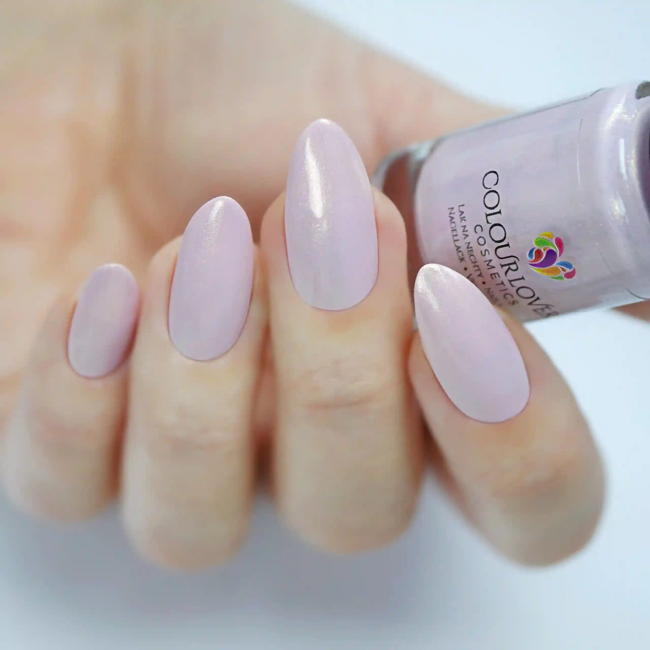 Radiant – Vegan 10-free light pink nail polish with a gold shimmer finish, plant-based, and cruelty-free