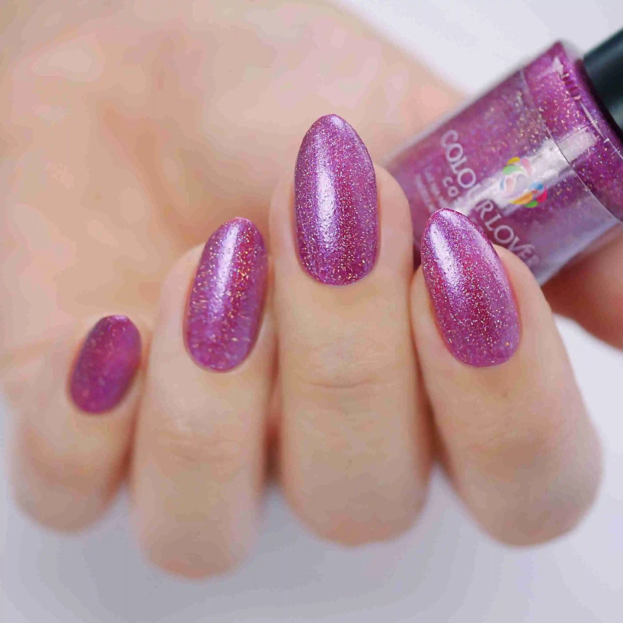 Holo Gems – Vegan 10-free holographic nail polish set with a shimmer finish, plant-based, and cruelty-free.