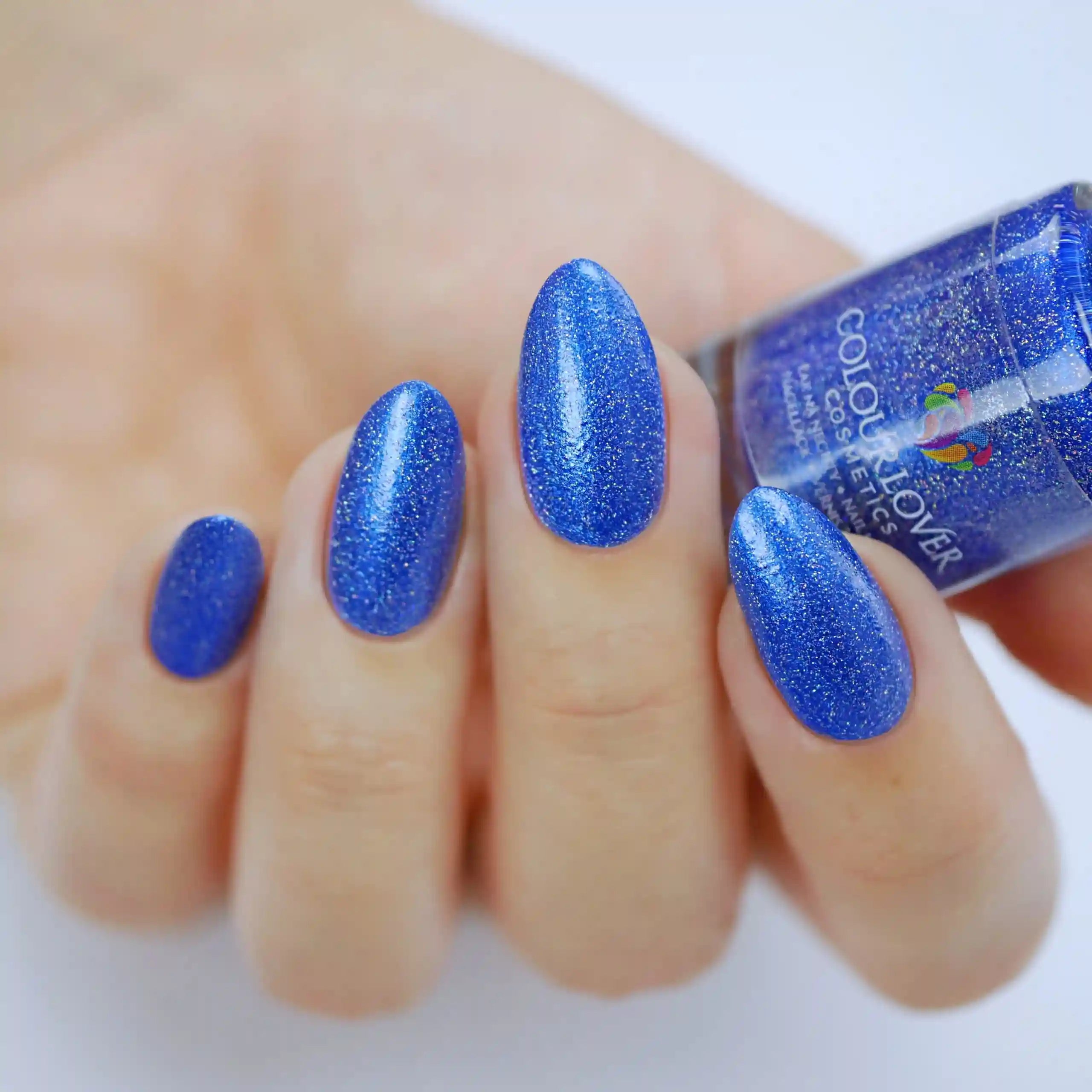 Sapphire – Vegan 10-free deep blue shimmer nail polish with a shimmer finish, plant-based, and cruelty-free