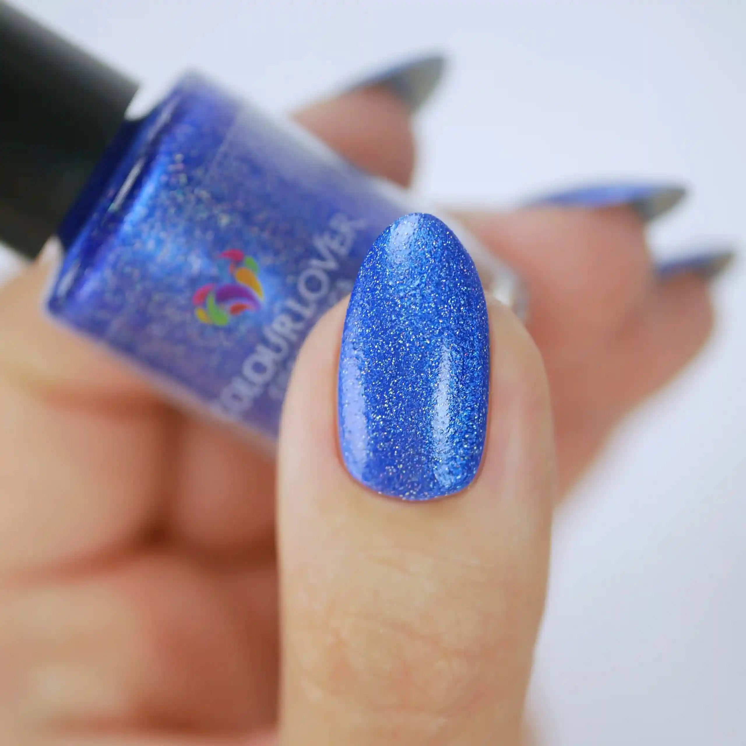 Sapphire – Vegan 10-free deep blue shimmer nail polish with a shimmer finish, plant-based, and cruelty-free