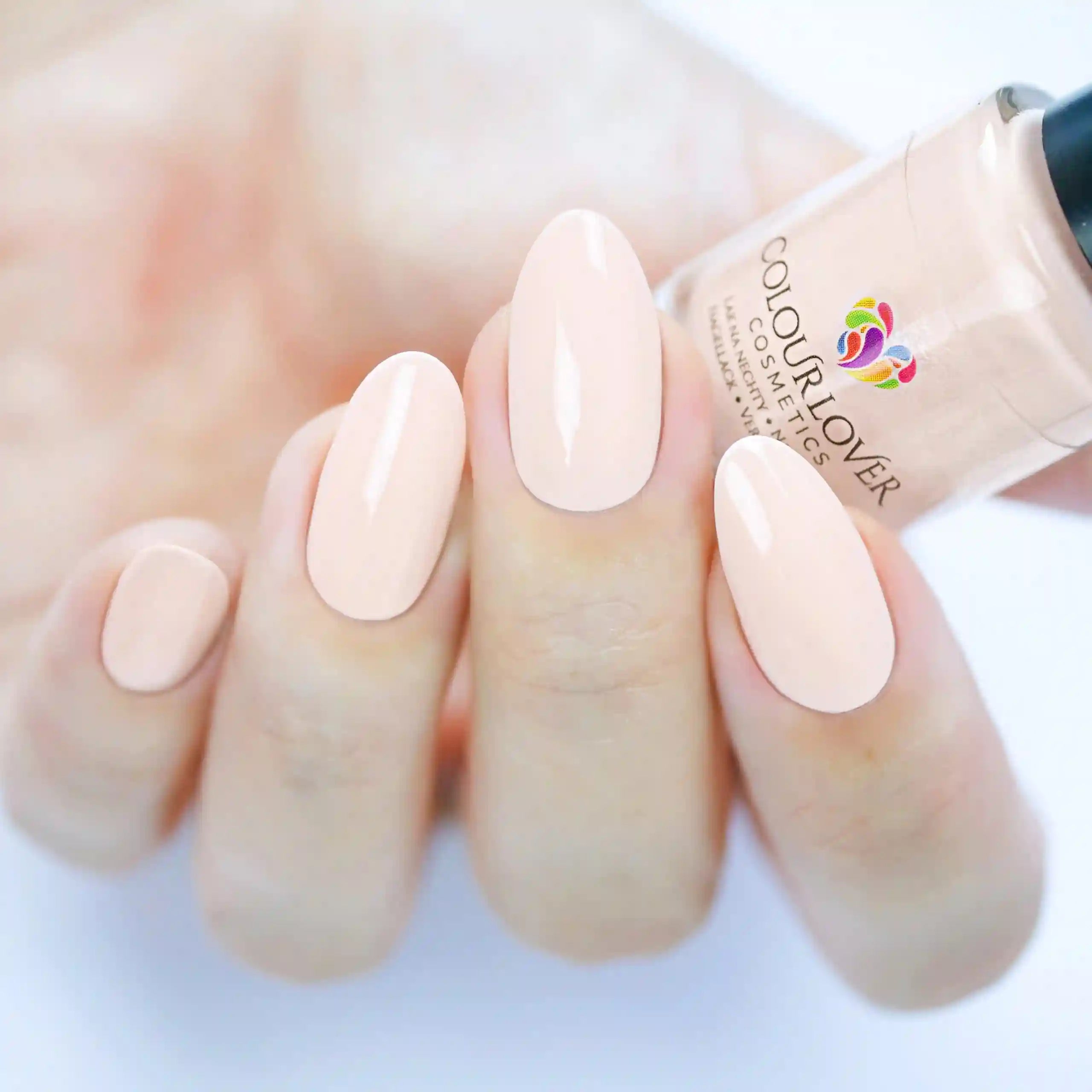 Soft nude and bronze shades with a holographic and metallic finish, perfect for summer manicures.