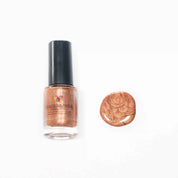 Amber vegan quick-dry nail polish in warm golden-orange with a high-shine finish, 10-free and cruelty-free.