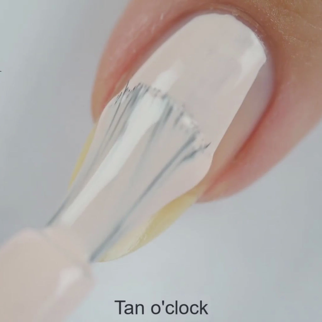 Tan O'Clock – Vegan 10-free tan nail polish with a smooth, long-lasting finish.