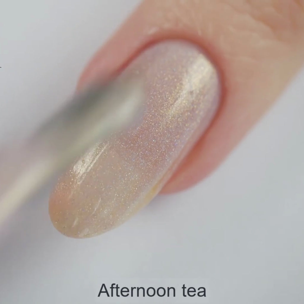 pink nail polish with gold shimmer and holographic pigment with plant based, 10-free, vegan, cruelty free, sustainable, safe and healthy formula handmade in Slovakia