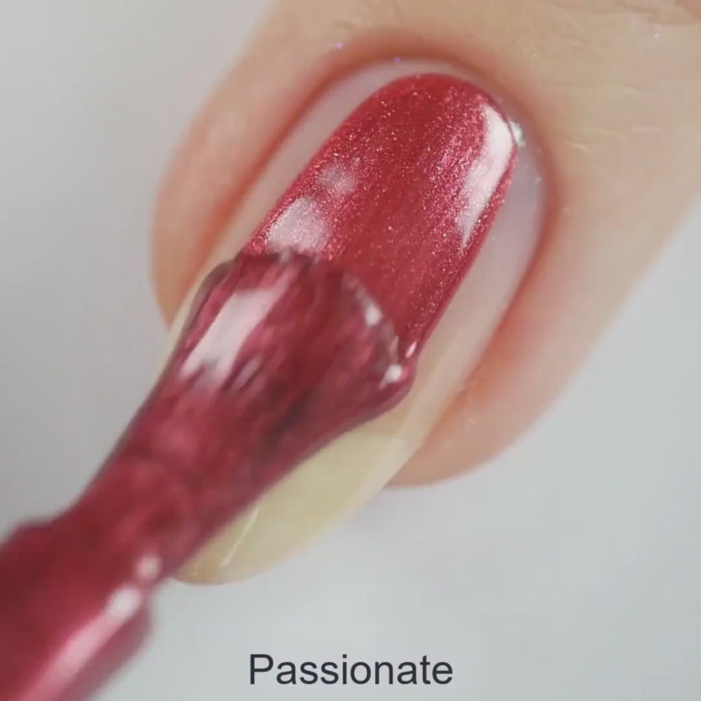 Passionate – Vegan 10-free cranberry red nail polish with a glossy finish, plant-based, and cruelty-free