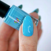 Clear Blue Sky – Vegan 10-free crystal blue nail polish with a glossy finish, plant-based, and cruelty-free